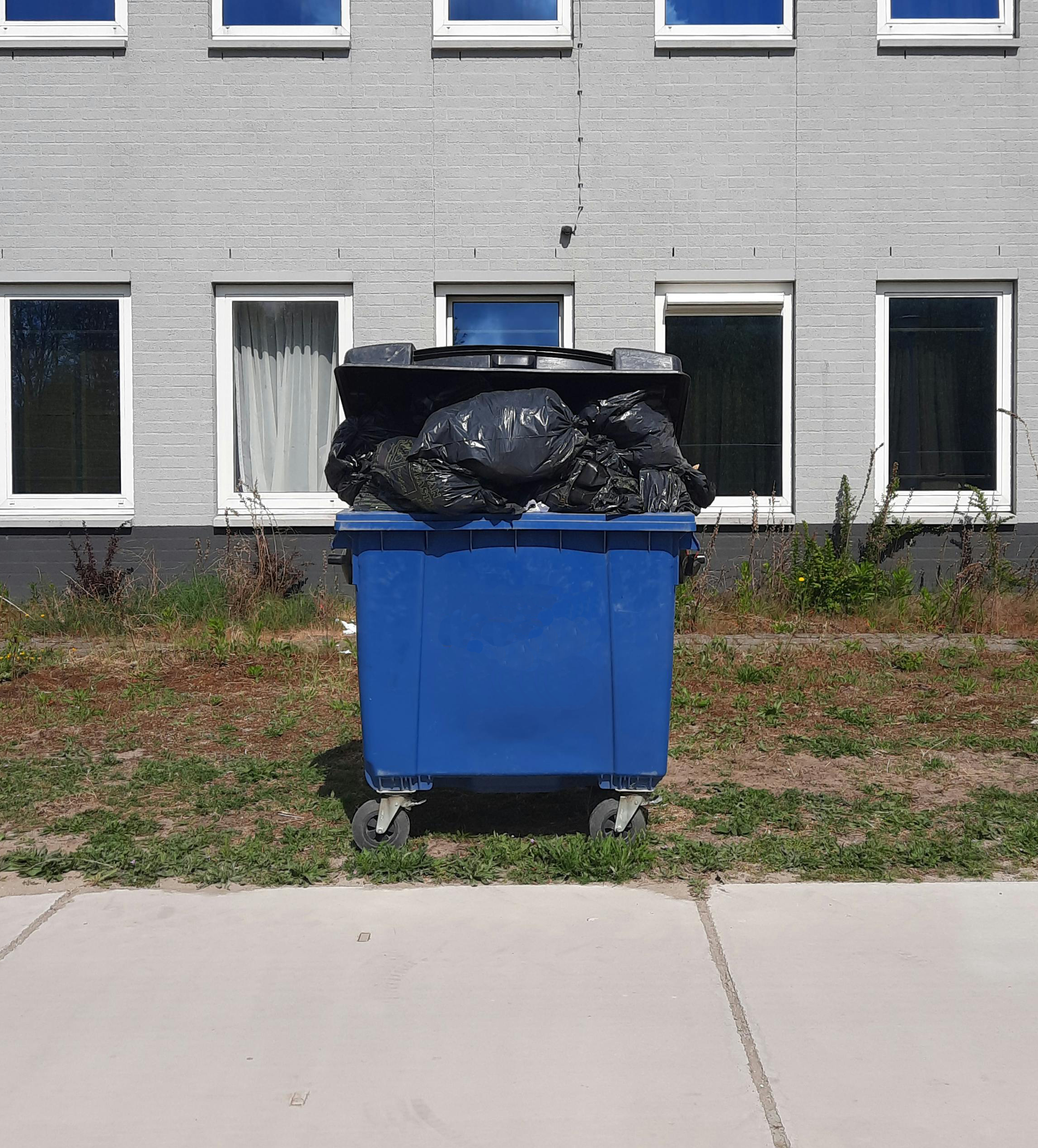 Close-up of a custom-printed polythene bag with a company logo